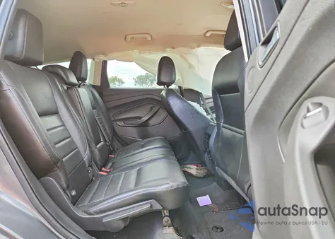 2014 Ford Escape Titanium z USA, uszkodzony, nr VIN 1FMCU9J92EUD62197